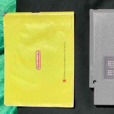 Game Cartridge and Manual - Back