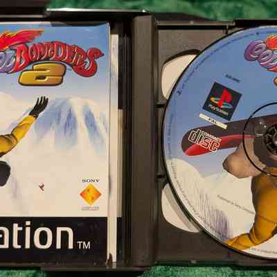Game Box - Open: Game disc and manual