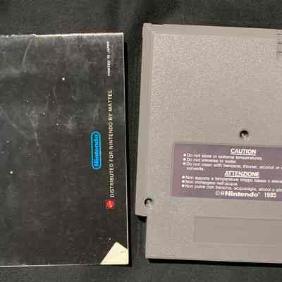 Game Cartridge and Manual - Back