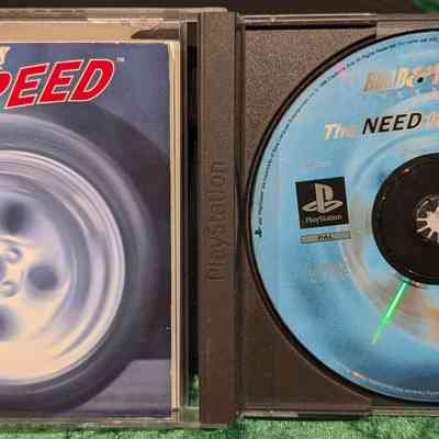 Game Box - Open: Game disc and manual