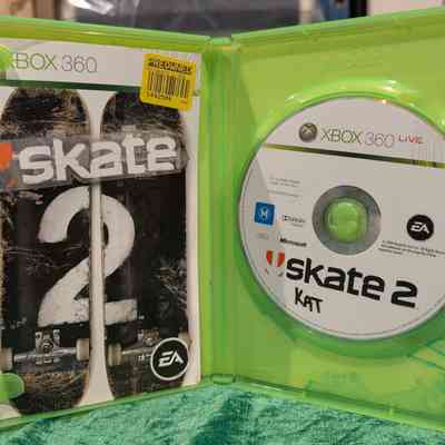 Game Box - Open: Game disc and manual