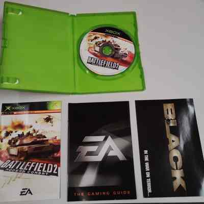 Game Box - Inside: Game disc, manual, EA Games catalogue, promotional flyer for game "Black"