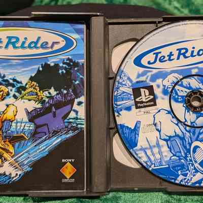 Game Box - Open: Game disc and manual