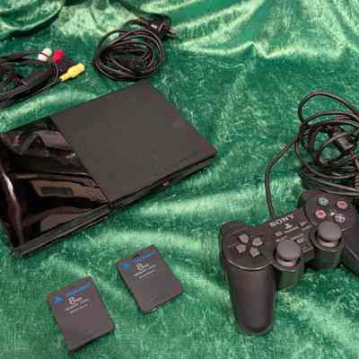 Sony PlayStation 2 Slim Console and Accessories