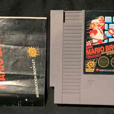 Game Cartridge and Manual - Front
