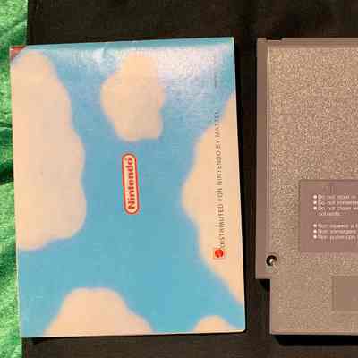 Game Cartridge and Manual - Back
