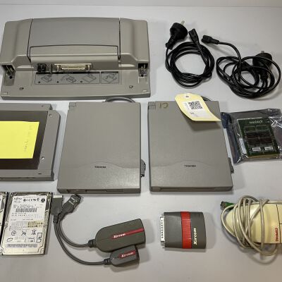 Box of Toshiba laptop accessories and components