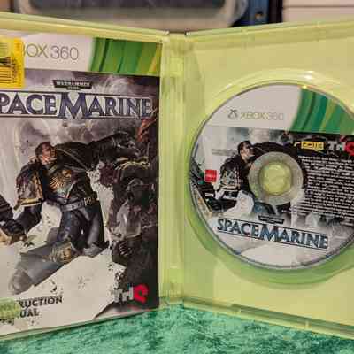 Game Box - Open: Game disc and manual