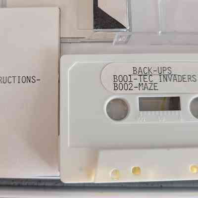 Game Box - Open: Cassette and instruction sheet