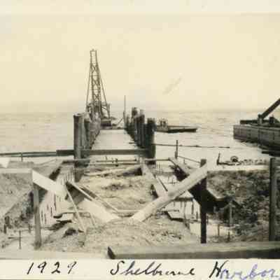 Foundation forms being build and pillings being driven in Shelburne Bay