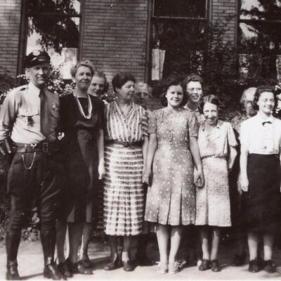 School staff at probably Elm Road school with Vera Viets and Police officer