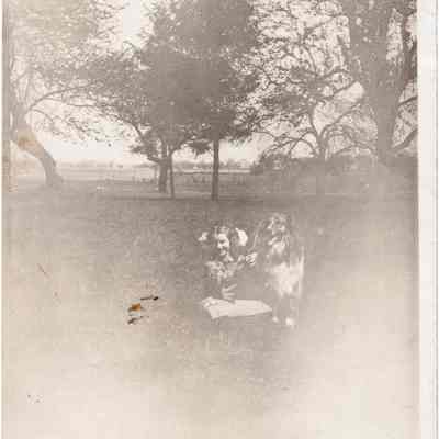 Girl with dog outside