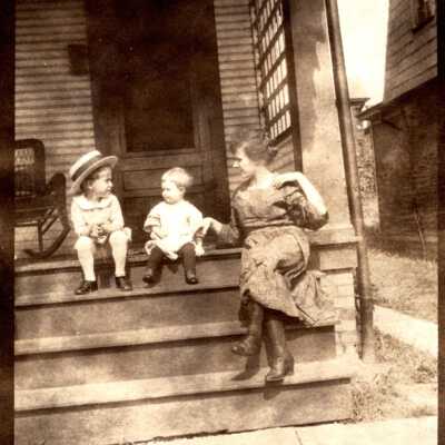 Woman with Two Children on Steps
