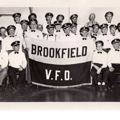 Group Image of Firemen with Brookfield V.F.D. Sign