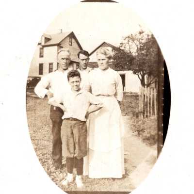 Group Portrait, 2 Men, Boy and Woman Standing