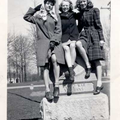 Mary Jane Bartolin with others on World War Veterans Monument