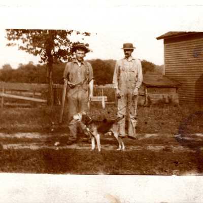 Two Men with Dog