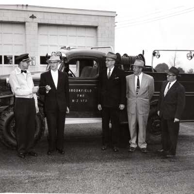 Men in Front of Firetruck