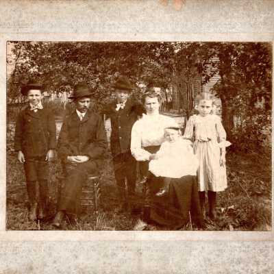 Family Photo of Six People Outside