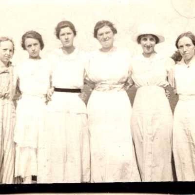 Six Women Standing Together Outside