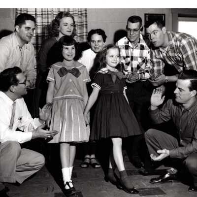 Group of Adults and Two Children