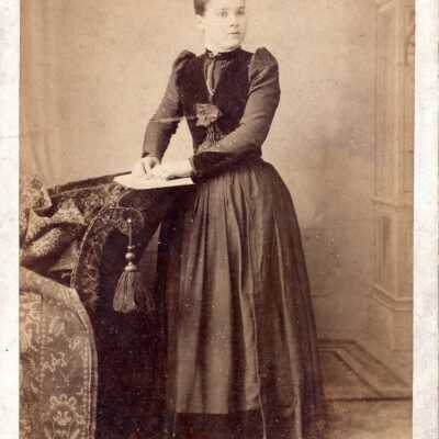 Portrait of a Woman Touching Paper