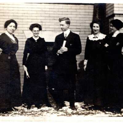 Women and Man Dressed in Black