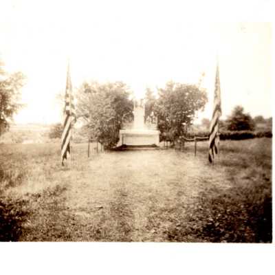 Photo of a Monument and Flags