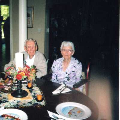 Russell Stewart at table with unknown person