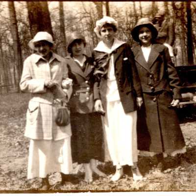 Four Women Outside by Car