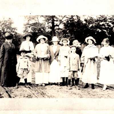 Group Portrait of Ten People Outside