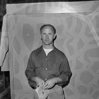 Man with booklet
