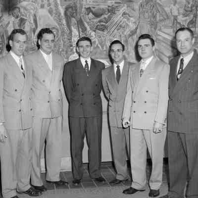 Six men in suits