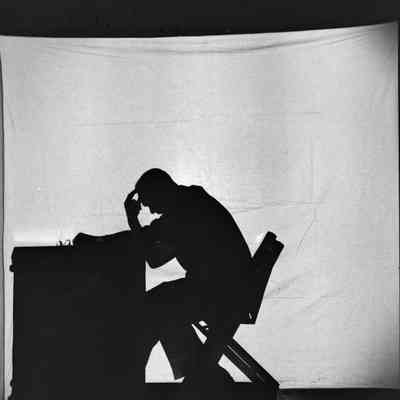 Man at desk silhouette