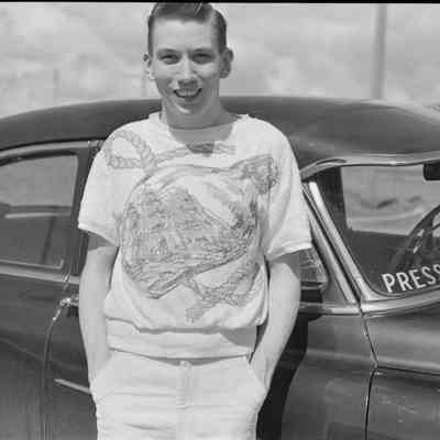 Man with press car