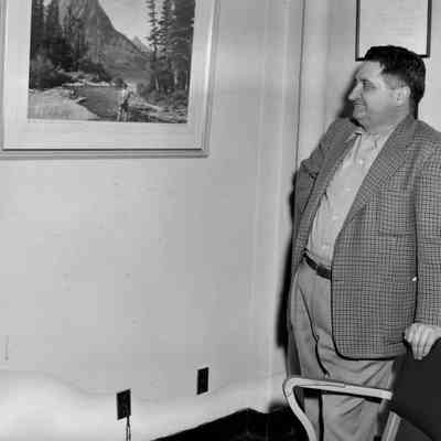 Man looking at a picture
