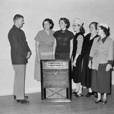 people and a radio