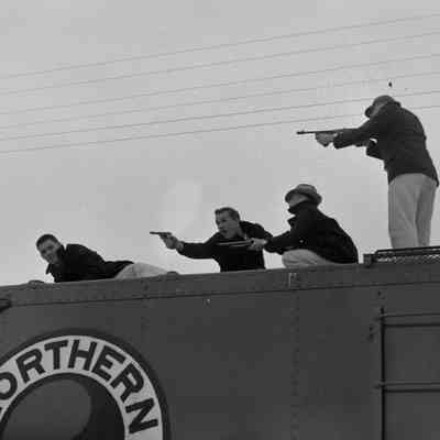 Robbers on top of train