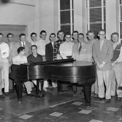 Male group photo at piano [SIMILAR TO #973]