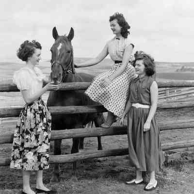 Women and a horse