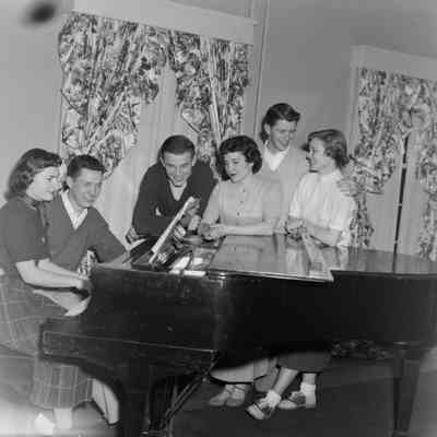 Couples at a piano