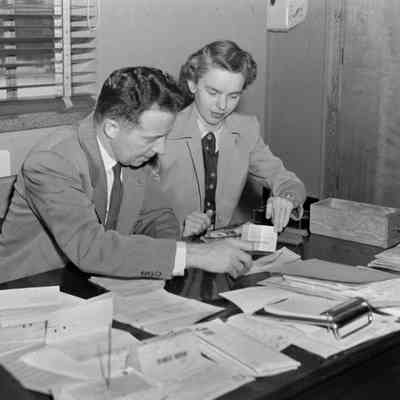 Man and woman at desk