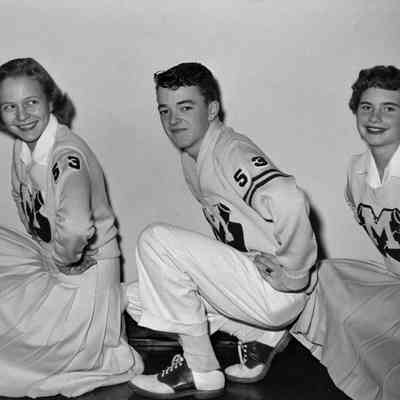 Three cheerleaders