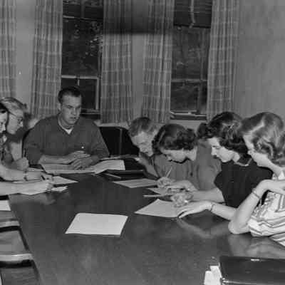 At the conference table