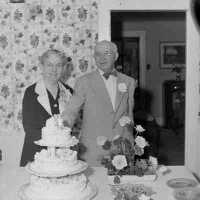 Senior couple with cake
