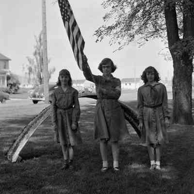 Girl Scouts with flag