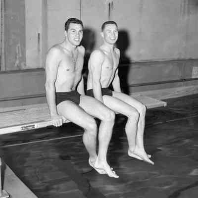 Men on a diving board