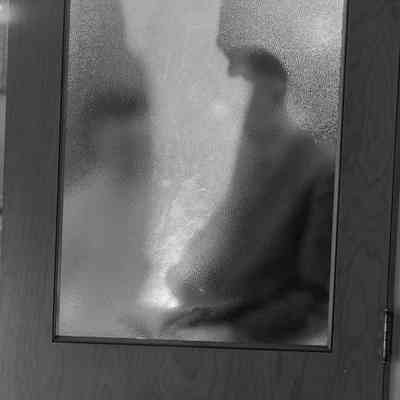 Men in window