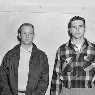 Two young men staring