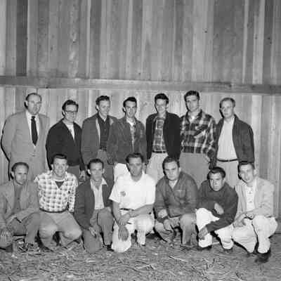 Men in a barn